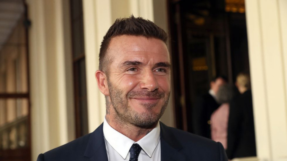 Is Your Suit This Flexible? See David Beckham's Suited Skills