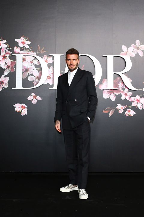 David Beckham has settled the suit v sneakers debate